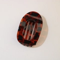 Detail of tortoise shell hair clip with glossy acrylic finish and vintage pattern - Oval Clip (Bulk) / Glossy Translucent Red Tortoiseshell