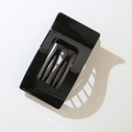 Macro detail of glossy black rectangular hair claw clip with hollowed-out resin design - Bulk/Loose Packaging / Glossy Black