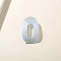 Elegant light blue pearlescent oval hair claw clip with a shimmering mermaid finish - Bulk Packaging / Mermaid Light Blue