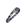 Close-up of marble pattern acetate duckbill hair clip with golden alloy spring - Triangle Black