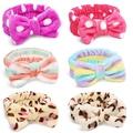 Detail view of 6-piece coral fleece bow headband set with polka dot and leopard patterns - Style B