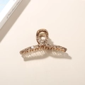 Large amber marble acetate shark hair claw clip for thick hair styling on a beige desk - Bulk Packaging / 13cm / Cross Claw Clip / Coffee Marble Pattern