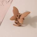 Gros plan détaillé d'une pince à cheveux papillon mate avec ressort en métal durable - Sans emballage / Kaki