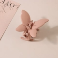 Close-up of pink matte butterfly hair claw clip with detailed spring and texture - Bulk Packaging / Lotus Pink