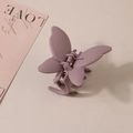 Detail view of purple matte butterfly hair claw clip with sturdy metal spring mechanism - Bulk Packaging / Taro Purple