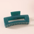 Detail of a large rectangular glossy dark green hair claw clip with strong spring - Bulk Packaging / Malachite green