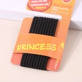 Primer plano de diez gomas para el pelo negras de alta elasticidad en tarjeta de marca - Alta elasticidad / Negro