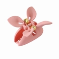 Pinza per capelli a farfalla rosa opaco con molla dorata su sfondo bianco - Rosa