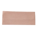 Detailed macro view of the soft pink knitted texture on this wide ribbed headband - Lotus Pink