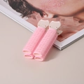 Nahaufnahme von rosa Volumen-Haarclips mit Klettverschluss und Katzenohr-Design - Rosa