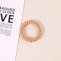 Elastic telephone wire hair tie in nude beige color for high ponytail styling - Glossy Earthy Yellow