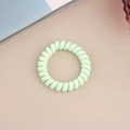 Elastic light mint green spiral telephone wire hair tie with a smooth matte finish - Matte Light Green
