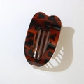 Flat oval tortoiseshell hair claw clip in dark amber resin for secure hair styling - Glossy Red Leopard