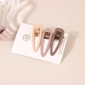 Detailed view of matte milk coffee color metal hair clip set on a white brand card - Water Drop Duckbill Clip Set