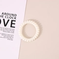 Minimalist white spiral telephone wire hair tie with high elastic resin material - Glossy Cream White