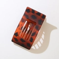 Flat oval tortoise shell hair clip with dark brown pattern and secure grip - Bulk/Loose Packaging / Matte Red Leopard