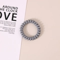 Elastic spiral hair tie in neutral grey color with a durable telephone wire design - Glossy Gray