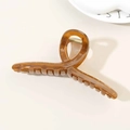 Minimalist twisted hair claw clip in translucent amber brown finish for women's updos - Glossy Caramel