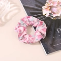 Detailed view of pink floral chiffon scrunchie with soft ruffled texture and sweet pattern - Floral Rose Pink