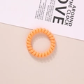 Bright orange spiral telephone cord hair tie with high elasticity and durable material - Glossy Orange Color