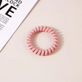 Minimalist pink spiral telephone wire hair tie with elastic resin structure - Glossy Pink