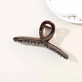 Dark brown tortoiseshell pattern hair claw clip with cross design for elegant styling - Glossy Transparent Dark Brown
