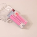 Detailed view of two pink hair volume clips in fillimilli packaging for styling - #9 Rose Red (boxed/pair)