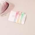 Detail view of macaron gradient hair clips set on a decorative handmade paper card - Hollow Rectangular Set
