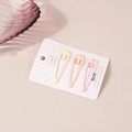 Close-up of three 6cm matte metal water-drop hair clips in cream pastel colors on card - Gradient Pink - Waterdrop Style