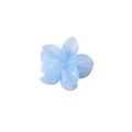 Detail of light blue 8cm plumeria hair claw clip with a glossy translucent finish - Bulk Packaging / Jelly Blue