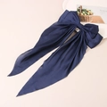 Elegant navy blue satin bow hair clip with flowing ribbons and a luxurious glossy finish - Navy Blue