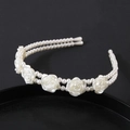 Elegant double-layered pearl headband with white 3D roses on a sleek black background - Double Layer Pearl Rose Style