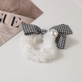 Detail of plush white hair scrunchie with houndstooth bow and pearl accent - Houndstooth-White