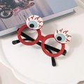 Funny Halloween party glasses with red glitter frames and spooky bloodshot eyeballs - Red Heart Glasses