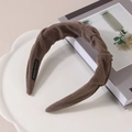 Detail of dark brown knot headband with soft suede texture and handmade woven label - Grey Brown