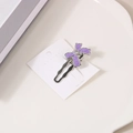 Y2K Haarspange aus Silbermetall mit lila Emaille-Schmetterling auf weißer Displaykarte - Lila Emaille-Schleife