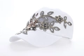 White baseball cap featuring gold floral embroidery and sparkling crystal rhinestones - White