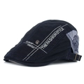 Dunkelblaue Schiebermütze mit grauen Einsätzen, Totenkopf-Badge und weißer Stickerei - Marineblau