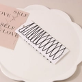 Set of 10 black wavy seamless metal hair clips on white display card for women - Style H
