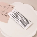 Set of 20 black seamless wave hairpins and U-shaped clips on a white display card - Style I