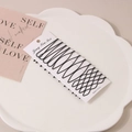 12-piece set of black matte metal hairpins featuring straight and wavy styles on a card - Style J