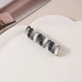 Spiral telephone wire hair tie with black grey white gradient and gold metal clasp - Black & White Stripes