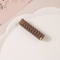 Molletta a spirale in resina ambrata traslucida con eleganti punte in metallo dorato - Marrone Jelly