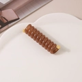 Brown spiral telephone wire hair tie with golden metal caps on a white tray - Jelly Coffee
