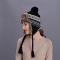 Black knit earflap trapper hat with brown faux fur lining and tassels for winter - Black
