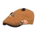 Detailed close-up of vintage floral embroidery and bow knot on brown cotton beret cap - Turmeric