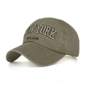 Detailed view of the New York embroidery on an olive green washed cotton baseball cap - Khaki