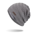 Grey winter knit beanie with thick cable patterns and warm fleece lining and leather tag - Gray