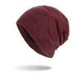 Winter knit beanie in burgundy color with warm black faux fur lining and textured pattern - Burgundy