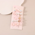 Five-piece pink starfish and seashell hair clip set with pearls on a card display - B Style-Pink Collection